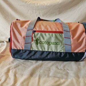Cotopaxi Ligera 32 Packabke Duffel Bag in Peach/Green